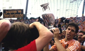 Marco van Basten lifts the European Championship trophy in 1988 after scoring the Netherlands’ second goal against the Soviet Union in Munich