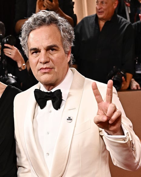US actor Mark Ruffalo US wears a pin reading ‘Be Good’, in tribute to Renee Good, at the 83rd annual Golden Globe Awards.