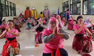 An Indonesian traditional dance class takes place in Jakarta on 9 August 2020, with participants wearing face shields to limit the spread of coronavirus.