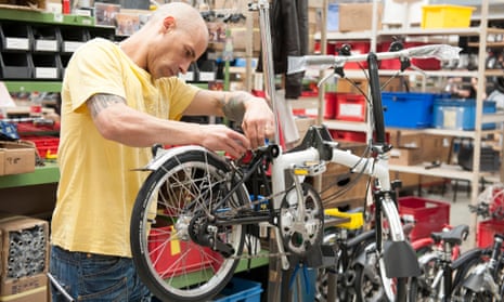 Assembling a folding bike at the Brompton Bicycle factory in Brentford, south-west London