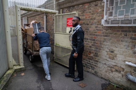 Chibs Ekeiwu opens the door for a man