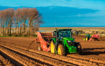 Tractors carrying out deep bed shaping followed by sowing the fields