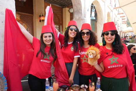 Morocco fans enjoying some food in Souq Waqif before the game.