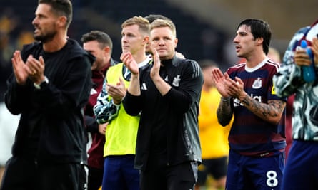 Eddie Howe applauds the travelling Newcastle United fans at full time.