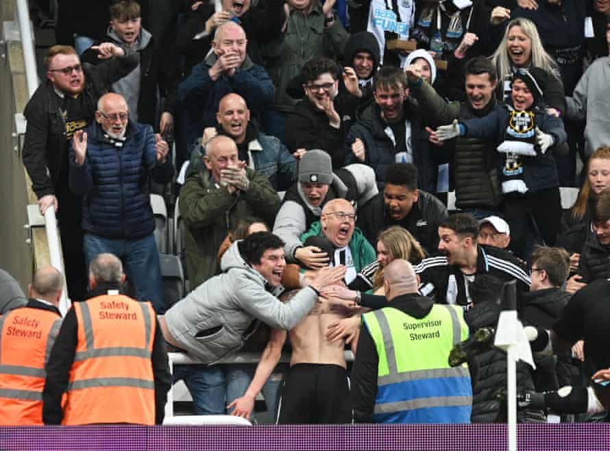 Miguel Almiron of Newcastle United celebrates scoring their first goal with the fans.