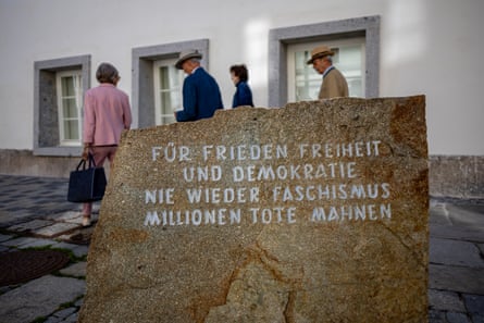 ‘For peace, freedom and democracy. Never again fascism. The millions who died serve as a warning.’