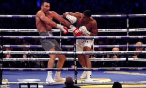 Anthony Joshua stuns Wladimir Klitschkowith a solid right in the fifth round of their fight at Wembley.