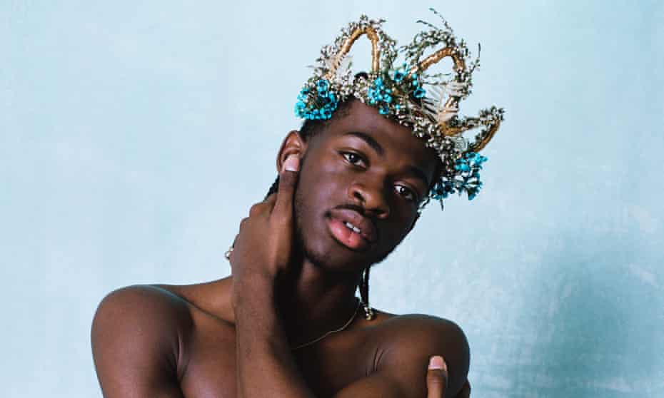 Lil Nas X wearing a crown with flowers in it