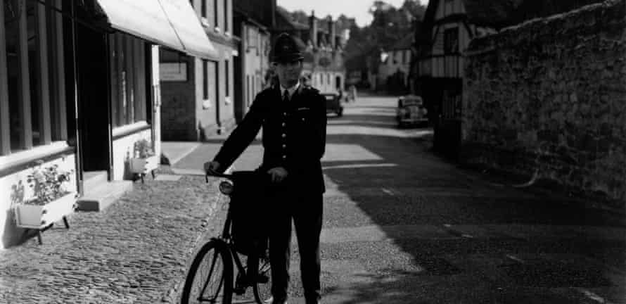 Biking BobbyA country police constable on bicycle duty in the Surrey village of Shere. (Photo by T Marshall/Getty Images) landscape;cycle;bicycle;male;Roles Occupations;policeofficer;British;English;Europe;Britain;England ;M/LAW/POLI(BRI)/PERSONNEL