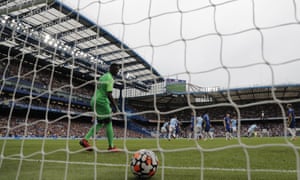 Chelsea goalkeeper Edouard Mendy reacts after being beaten by a deflected shot from Gabriel Jesus as the Manchester City player wheels away in celebration.