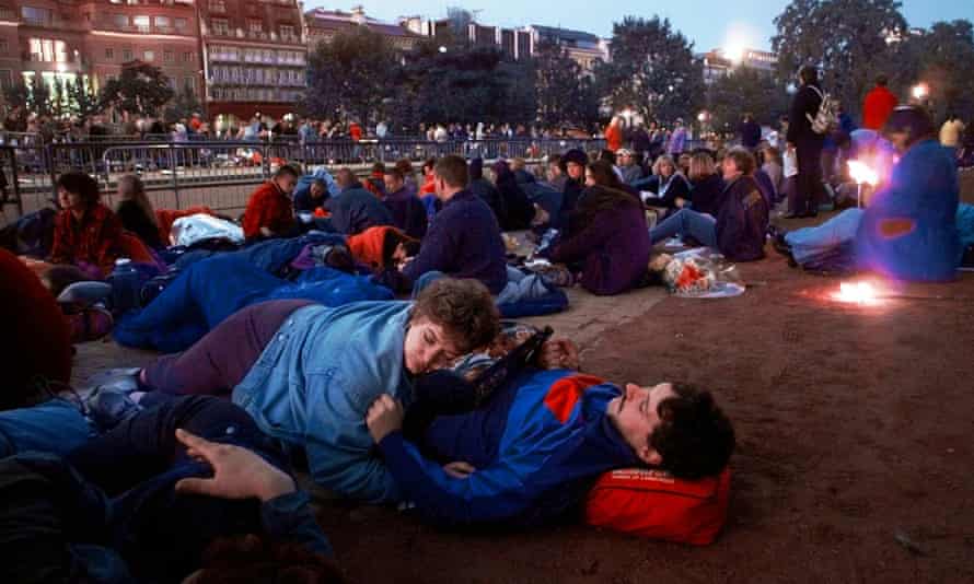 Mourners sleep at Hyde Park Corner in London before the start of Diana's funeral procession.