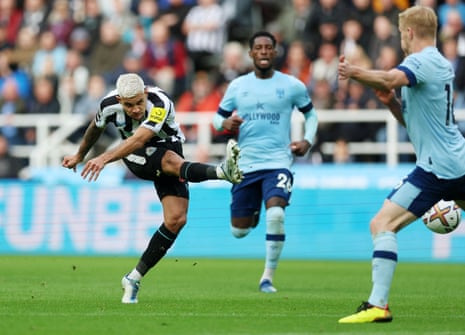 Newcastle United's Bruno Guimaraes scores their third goal against Brentford.