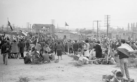 Families seeking new homes gather on the outskirts of Santiago in 1967.