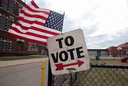 A sign to a polling booth in Dearborn, Michigan, the Detroit suburb home to the largest Arab American community in the country