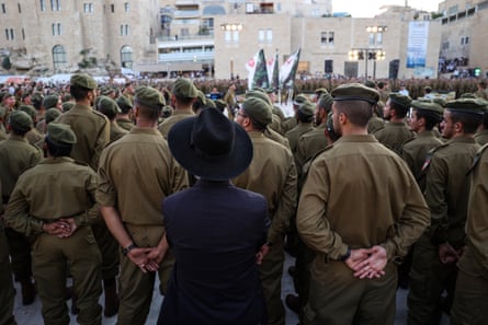 Israeli soldiers from the Netzah Yehuda Battalion take part in a swearing-in ceremony in Jerusalem at the end of their military training last week.