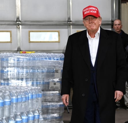 Trump with crates of Trump water in East Palestine after a train derailed in Ohio.