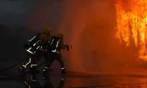 Firefighters fighting fire.