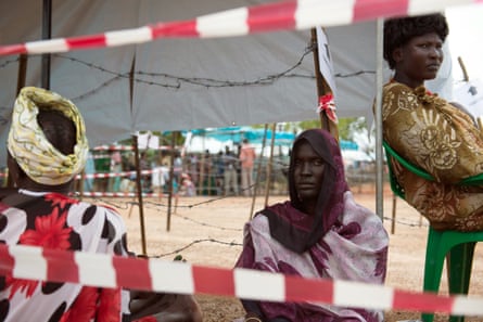 Women wait in line for food distribution at the UN Protection of Civilians site in Tomping, South Sudan