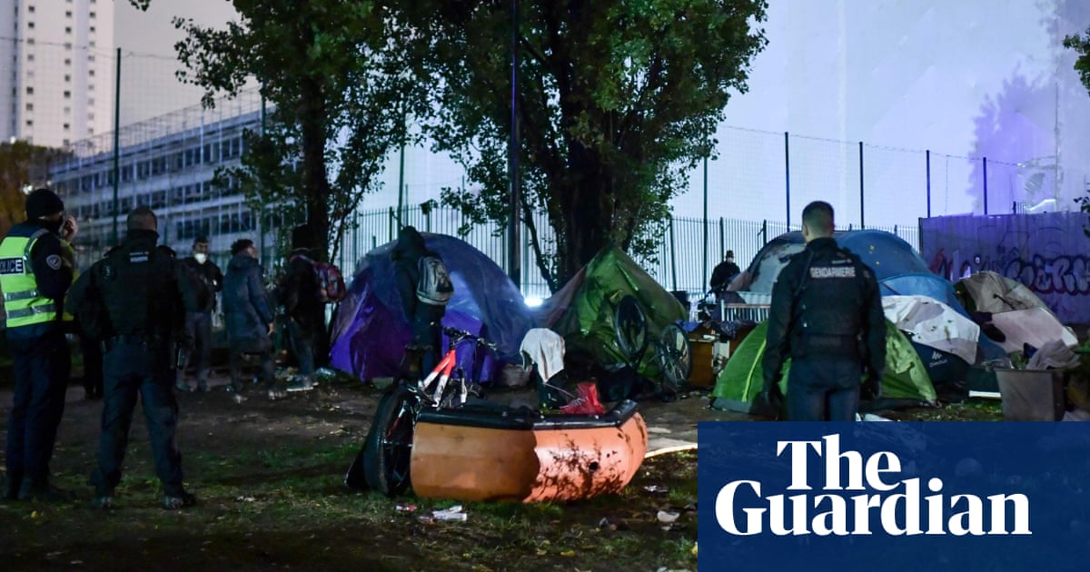 French police begin clearing makeshift migrant camp in Paris