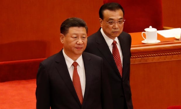 Xi Jinping and Premier Li Keqiang arrive for the ceremony to mark the 90th anniversary of the founding of the China’s People’s Liberation Army at the Great Hall of the People in Beijing.