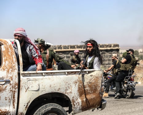 Fighters in Sweida.