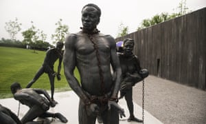 A sculpture depicting the slave trade at the entrance of the National Memorial For Peace And Justice.