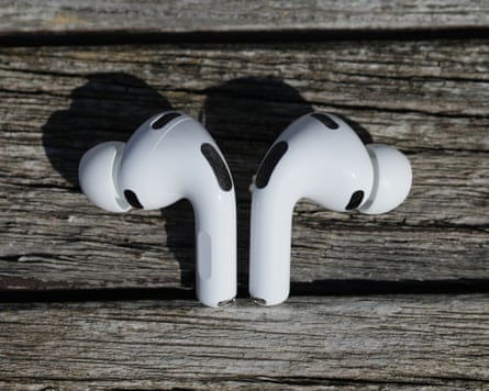The AirPods Pro 3 laying on a table.