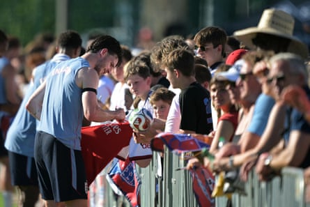 England midfielder Declan Rice signs autographs after a training session on Saturday