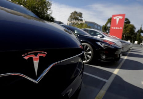 A Tesla Model X is alongside a Model S at a dealership in Sydney