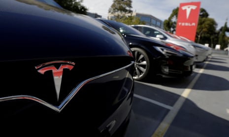 A Tesla Model X is photographed alongside a Model S at a Tesla electric car dealership in Sydney