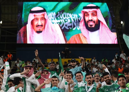 King Salman and the crown prince shown on screen at a Saudi Premier League game in Riyadh in September.
