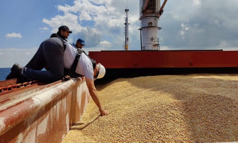 TURKEY-UKRAINE-RUSSIA-UN-AGRICULTUREThis handout picture taken and released by the Turkish Defence ministry press office on August 3, 2022, shows an inspection delegation member inspecting the Sierra Leone-flagged cargo ship Razoni carrying 26,000 tonnes of corn from Ukraine, off the coast of north-west Istanbul. - A team of Russian and Ukrainian officials in Turkey is due on August 3, 2022, to inspect the first shipment of grain exported from Ukraine since Moscow’s invasion under a deal aimed at curbing a global food crisis. The Sierra Leone-flagged Razoni arrived at the edge of the Bosphorus Strait just north of Istanbul on Tuesday, a day after leaving the Black Sea port of Odessa carrying 26,000 tonnes of maize bound for Lebanon.