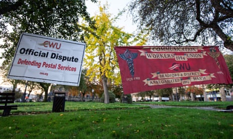 CWU banners hung on a Royal Mail workers picket line