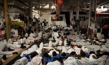 Migrants rescued off the coast of Libya sleep aboard the Geo Barents, a rescue vessel operated by MSF.