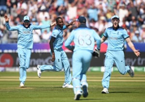 Archer celebrates after taking Guptill, caught by Buttler for eight.