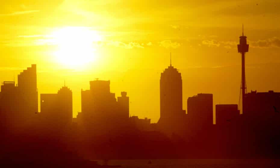 The sun setting over Sydney
