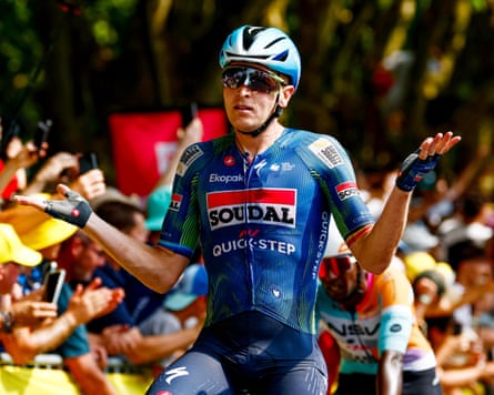Tim Merlier shrugs his shoulders successful delight aft his shape victory