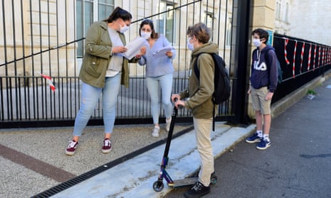 Supervisors speak to students before they restart school in Bordeaux as pupils returned to secondary school in ‘green’ areas of the country