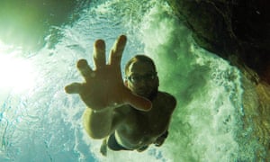 Calum MacLean ducks beneath the surface in the Cairngorms.