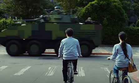 A scene from the Taiwan TV series Zero Day. Two people on bikes confront a tank.