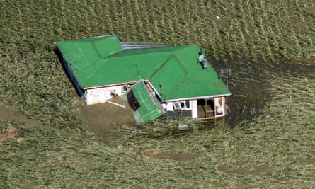 A house lays destroyed by Cyclone Gabrielle in the Esk Valley near Napier