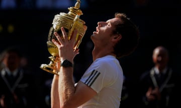 Andy Murray lifts the men's singles trophy at Wimbledon 2013 after beating Novak Djokovic