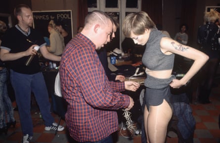 Alexander McQueen and a model backstage in 1996.