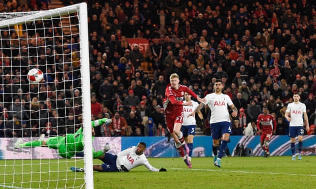 Josh Coburn watches his strike beat Hugo Lloris for Middlesbrough’s extra-time winner against Spurs.