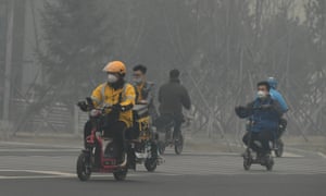 Coronavirus live news: record daily cases in South Africa as India extends lockdown 1 People wearing face masks ride motorcycles in smog on 15 April, 2020 in Changchun, Jilin Province of China.