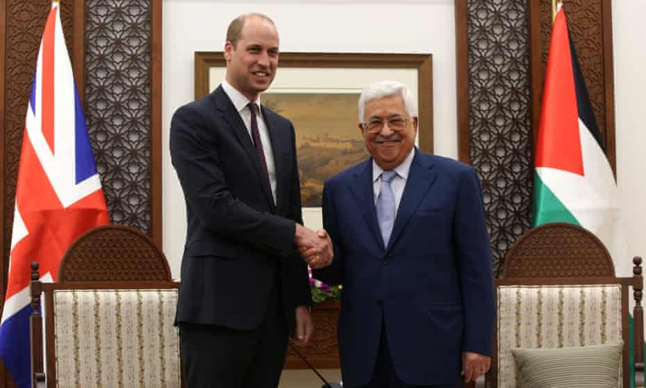 Prince William shakes hands with the Palestinian president, Mahmoud Abbas, in Ramallah.