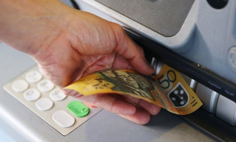 Cash being withdrawn from an ATM