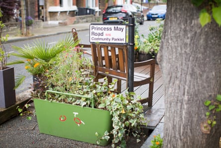 Sign on back of chair reads ‘Princess May Road community parklet’