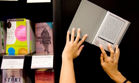 an e-reader next to books on display in a branch of Waterstones.
