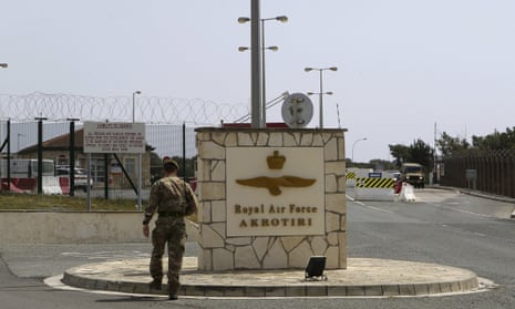 A British soldier at the gated entrance to RAF Akrotiri